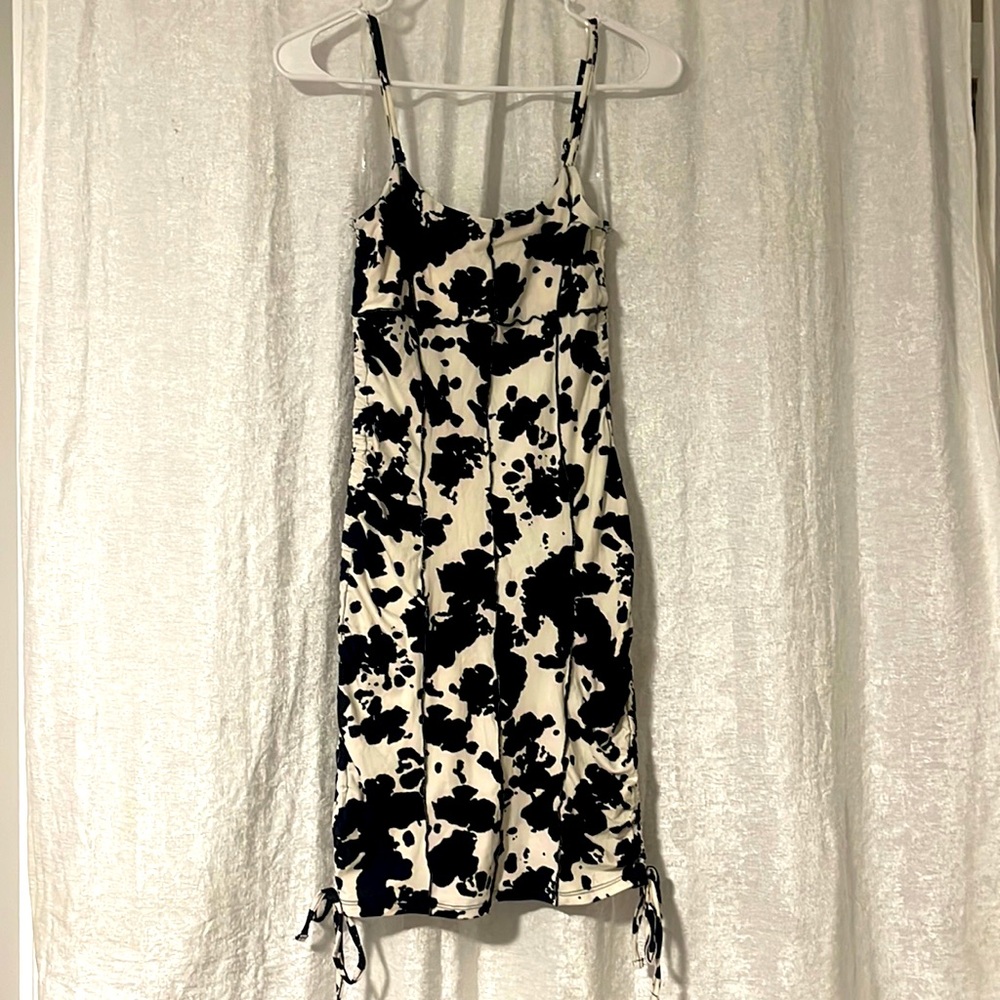 Cow print cowgirl dress, size medium. Adjustable spaghetti strap.